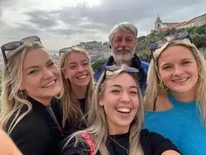 João explaining Lisbon to guests at an Alfama viewpoint during a private tour