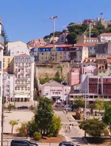 View from Martim Moniz towards the historic line of Lisbon's Fernandine wall climbing towards Mouraria.